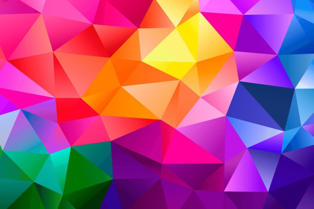 A bright geometric design that resembles rainbow-colored folded paper.