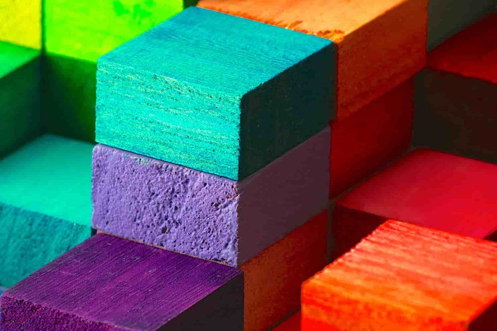 A close-up photo of colorful wooden children’s blocks.