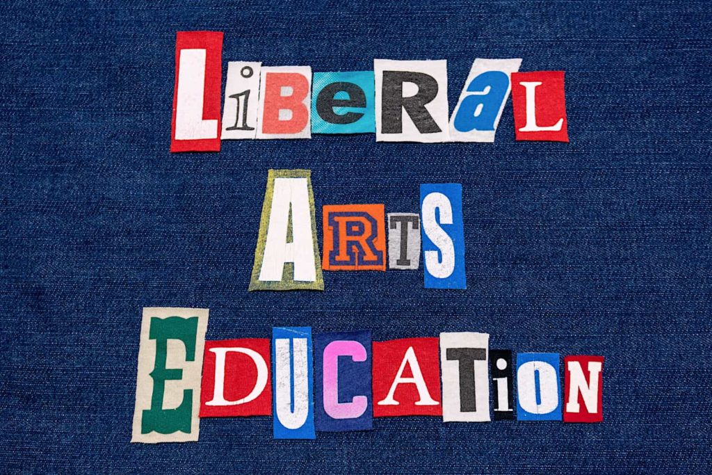 “Liberal Arts Education” spelled out in colorful letters on a denim background.