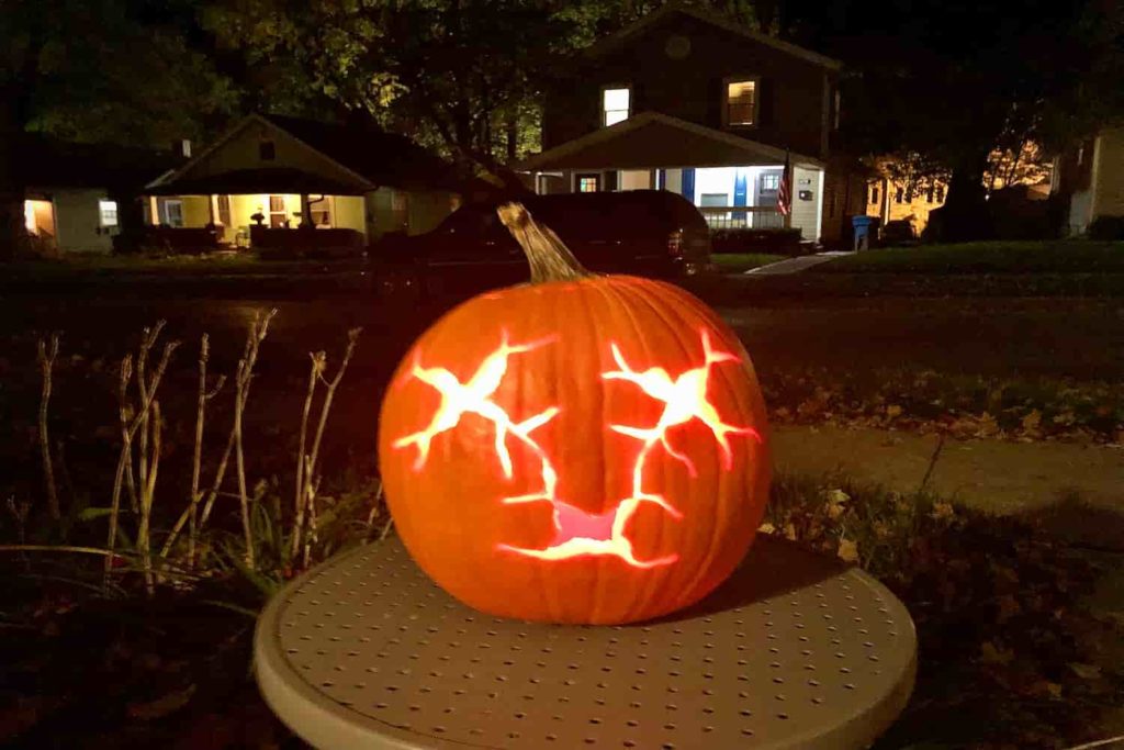 A jack-o-lantern carved with three neurons instead of face.